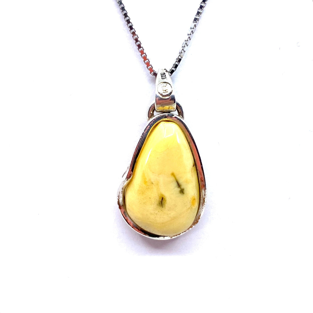 Beautifull Natural Butterscotch Baltic Amber Pendant on a silver chain