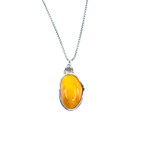 Petite Butterscotch Pendant on a Sterling Silver Chain.